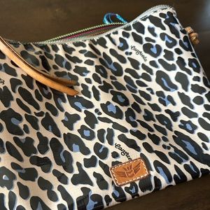 Consuela Crossbody with cheetah print and turquoise embroidery.